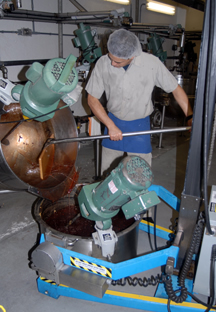 Washington State - Workers at Aplets & Cotlets tour craft apple creations