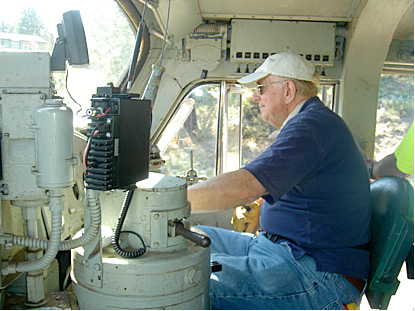 Teb Blishak driving a locomotive