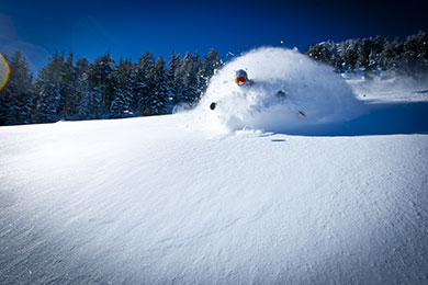 Mammoth skier blasting powder