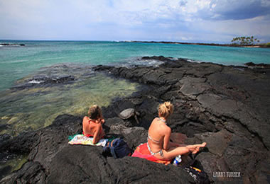 Women with turtle in Hawaii