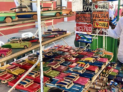 Cuba, classic American car models booth