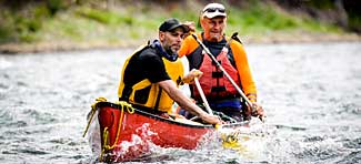 Canoeing whitewater rapids