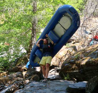 Clear Creek Klamath Basin rafting carrying rubber duckies to the put-in