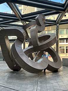 Outdoor art 2 is the strangely titled Nobody Here But Us by British artist Richard Deacon CBE in the plaza of the Asian Development Bank.